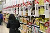 A customer shops at a major discount chain store in Seoul on April 13. [YONHAP]