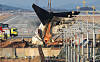 A tail section of Jeju Air's crashed aircraft is tied to a crane at Muan International Airport in South Jeolla on Jan. 3. [NEWS1]