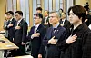 Attendees including Park Dan, far right, of the Korean Medical Association salute the Korean flag before the opening of a forum to discuss the normalization of medical education held at the National Assembly on March 10. [YONHAP]