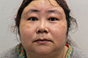 An undated handout picture released by the Metropolitan Police Service (MPS) on Sept. 29 in London shows Chinese national Zhimin Qian, alias Yadi Zhang, who was convicted for over her role in a multi billion-dollar Bitcoin fraud, posing for a photograph. [AFP/YONHAP]