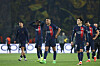 Paris Saint-Germain's Lee Kang-in, second from right, along with teammates Kylian Mbappe and Ousmane Dembele react as they walk off the pitch at the end of the UEFA Champions League semifinal second leg match against Borussia Dortmund at Parc des Princes in Paris on Tuesday. [AFP/YONHAP]