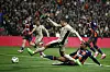 Paris Saint-Germain's Kylian Mbappe scores the team's second goal at Stade de la Mosson in Montpellier, France on Sunday. [REUTERS/YONHAP]