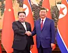 Chinese President Xi Jinping, right, and North Korean leader Kim Jong-un shake hands at the Great Hall of the People in Beijing, China on Sept. 4. [REUTERS/YONHAP]