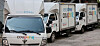 Coupang delivery trucks are parked in Seoul on May 7. [YONHAP]