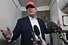 U.S. President Donald Trump speaks to reporters on board Air Force One in Morristown, New Jersey on July 4. [AP/YONHAP]