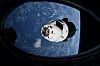 The SpaceX Crew Dragon capsule Endeavor, carrying four astronauts, approaches the International Space Station orbiting the Earth April 24, 2021. [REUTERS/YONHAP]