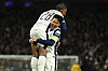 Tottenham Spurs Son Heung-min lifts up scorer Wilson Odobert after scoring his second goal during the Europa League round of 16 second leg soccer match against AZ Alkmaar at the Tottenham Hotspur stadium in London on March 13. [AP/YONHAP]