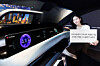 A model poses with LG Display's 40-inch automotive display that commenced mass production on Feb. 24, according to the panel maker. [LG DISPLAY]