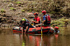 Search and rescue workers use a sonar device while paddling down the Guadalupe River looking for survivors or the remains of victims swept up in the flash flooding in Hunt, Texas, on July 7. Heavy rainfall early Friday caused severe flash flooding along the Guadalupe River in central Texas with more than 90 fatalities reported. [AFP/YONHAP]