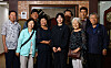 Huh Mi-mi, center, stands alongside descendants of independence activists in front of a Korean national flag at the entrance to an association for such descendants in Mapo District, western Seoul, on Aug. 14. [KIM JONG-HO]