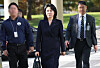 Kim Hye-kyung, wife of Democratic Party leader Lee Jae-myung, arrives at the Suwon District Court on Thursday for the final hearing into the election law violation case against her. [YONHAP]