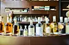 Liquors from Menge Craft Distillery line up on a table. [KORAIL TOURISM DEVELOPMENT]