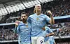 Manchester City's Erling Haaland, right, celebrates with Bernardo Silva after scoring his side's opening goal during a Premier League game against Wolverhampton Wanderers at the Etihad Stadium in Manchester on Saturday. [AP/YONHAP]