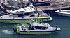 This image taken from video provided by WSVN-TV shows Miami-Dade Fire Rescue and others in boats around what appears to be a barge involved in an accident with a group of kids and an adult on a sailing boat during a sailing camp in Miami, Florida, on July 28. [AP/YONHAP]