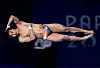Woo Ha-ram of Korea competes in the men's 3-meter springboard final in Paris on Thursday. [REUTERS/YONHAP]