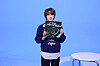BTS member Jin holds up his single ″The Astronaut″ (2022). [BIG HIT MUSIC]