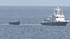A wooden boat, which four North Koreans used it to cross over the NLL to defect to South Korea, towed to shore in Sokcho, Gangwon, on Tuesday. [YONHAP]