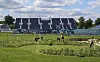 Staff members arrange the landscape at the equestrian arena at the Chateau de Versailles near Paris on July 17. [XINHUA/YONHAP]