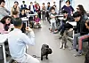 A pet expert educates middle-aged students in a pet sitter training program. [SEOUL METROPOLITAN GOVERNMENT]