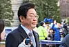 Democratic Party leader Lee Jae-myung arrives at the Seoul High Court in Seocho District, southern Seoul, on Jan. 23. [YONHAP]