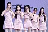 Girl group ILLIT poses for photos during a showcase for the release of its 3rd EP, “bomb,” at the Yes24 Live Hall in eastern Seoul on June 16. [DANIELA GONZALEZ PEREZ]
