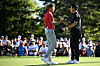 Sam Burns and Tom Kim shake hands on the 18th hole green after their match on day four of the 2024 Presidents Cup at The Royal Montreal Golf Club in Montreal, Quebec on Sunday.  [GETTY IMAGES]