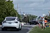 Demonstrators protest against Tesla and its CEO Elon Musk, outside a Tesla service center and gallery in Austin, Texas on June 21. [REUTERS/YONHAP]