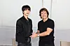 BTS's Jin, left, and actor Tom Cruise met for a recent episode of ″Run Jin″ [LOTTE ENTERTAINMENT]