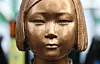 A statue of a girl symbolizing the victims of Japanese wartime sexual slavery, euphemistically called ″comfort women,″ is seen in front of the grounds of the former Japanese embassy to Korea in central Seoul on Dec. 28, 2025. [YONHAP]