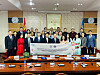 Jeonbuk National University President Yang O-bong, center in front row, pose for a photo with Bayanzürkh District officials after signing a memorandum of agreement with the district on July 10. [JEONBUK NATIONAL UNIVERSITY]