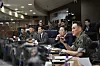 President Lee Jae-myung, second from right, listens to a briefing at the Joint Chiefs of Staff (JCS) headquarters in Yongsan District, central Seoul, on June 4. [MINISTRY OF NATIONAL DEFENSE]