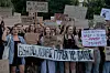 Protesters shout slogans and hold placards during a demonstration against a law that removes the independence of the NABU and SAPO anticorruption agencies, in Kyiv on July 24 amid the Russian invasion of Ukraine. AFP/YONHAP]