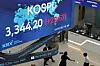 The Kospi closed at a record high of 3,344.20, up 0.9 percent from the previous trading day, shown on the Korea Exchange’s electronic display board in Yeouido, western Seoul, on Sept. 11. [YONHAP]