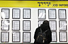 A job seeker looks at postings at an employment and welfare center in Mapo District, western Seoul, on March 17. [YONHAP]