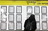 A job seeker looks at postings at an employment and welfare center in Mapo District, western Seoul, on March 17. [YONHAP]