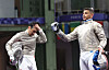 Gu Bon-gil, left, reacts after losing the round of 32 in the individual men's sabre event on Saturday in Paris. [YONHAP]
