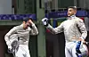 Gu Bon-gil, left, reacts after losing the round of 32 in the individual men's sabre event on Saturday in Paris. [YONHAP]