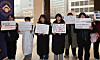 Members of the National University Student Association Network on Wednesday gathered outside the Westin Josun Hotel, where a general meeting of the Korean Council for University Education took place, to protest against tuition hikes. [YONHAP]