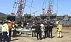 Firefighters at the scene wait for a structure to be lifted by crane to carry out rescue operations. In May 2024, two workers at a shipbuilding company in South Gyeongsang died after being crushed under a ship structure. [GYEONGSANGNAM-DO FIRE DEPARTMENT]