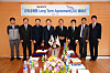 EcoPro founder Lee Dong-chae, fourth from left, takes a photo with Sony executives after the two signed a long-term cathode supply deal in March 2015. [ECOPRO]
