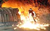 Workers handle molten metal at a blast furnace at Gwangyang Steelworks in Gwangyang, South Jeolla, on Aug. 7, 2024. [YONHAP]