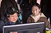 A behind-the-scenes image from ″Exhuma,″ with director Jang Jae-hyun, left, and actor Kim Go-eun [SHOWBOX]