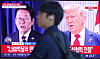 A TV at Seoul Station in central Seoul on July 31 shows a report that the Donald Trump administration has agreed to impose 15 percent tariffs on Korean imports, 10 percentage points lower than what was proposed, under a trade deal that would impose no tariffs the other way. [YONHAP]