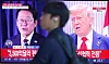 A TV at Seoul Station in central Seoul on July 31 shows a report that the Donald Trump administration has agreed to impose 15 percent tariffs on Korean imports, 10 percentage points lower than what was proposed, under a trade deal that would impose no tariffs the other way. [YONHAP]