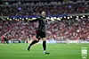 Korea's Son Heung-min celebrates scoring a goal during a 2026 World Cup qualifier against Singapore at the Singapore National Stadium in Singapore on Thursday. [NEWS1]
