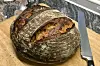 A freshly-baked loaf of sourdough bread [AP/YONHAP]