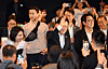 President Lee Jae Myung, center, and actor Cho Jin-woong, on Lee's right, are seen during a screening of ″La Resistance″ at CGV Yongsan in Yongsan District, central Seoul on Aug. 17. [JOINT PRESS CORPS]