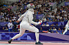 Egypt's Nada Hafez competes with the United States' Elizabeth Tartakovsky in the women's individual sabre round of 32 at the Paris Olympics at the Grand Palais in Paris on Monday.  [AP/YONHAP]