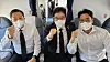 From left, former Minister of Patriots and Veterans Affairs Hwang Ki-chul, National Assembly Speaker Woo Won-shik and actor Cho Jin-woong are seen on a plane as part of a delegation that repatriated the remains of General Hong Bum-do from Kazakhstan [SCREEN CAPTURE]
