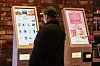 A moviegoer buys tickets at a kiosk set up at a cinema in downtown Seoul on March 27. [NEWS1]